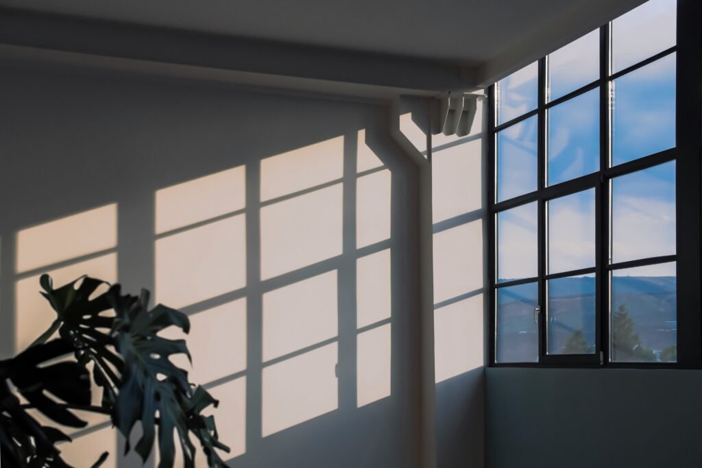 Morning sunlight through a bedroom window